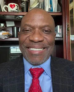 Professional portrait of Dr. Dominic Nkwocha, MD